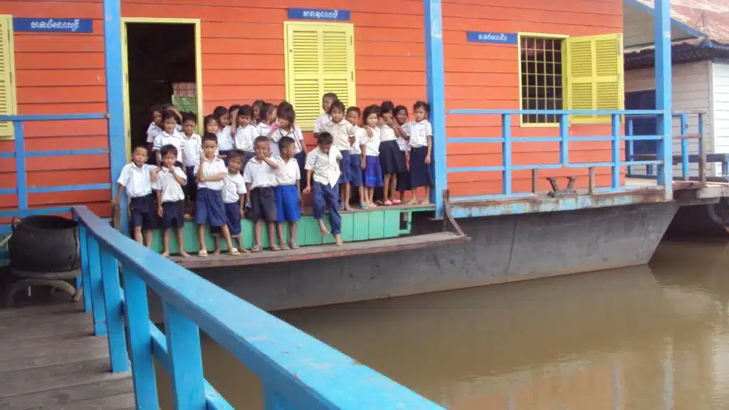 Sunset Cruise at Tonle Sap Lake student at floating village